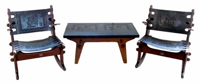 Lot 515 - Mid 20th century South American coffee table and two rocking chairs.