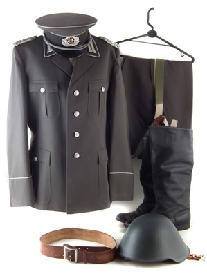 Lot 205 - East German Infantry tunic, trousers, belt, cap, helmet and a pair of Russian made boots.