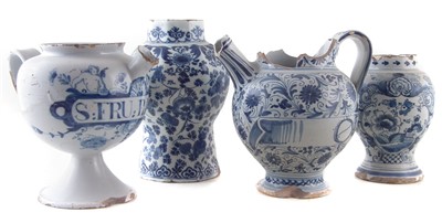 Lot 215 - Two Delft vases and two jars.