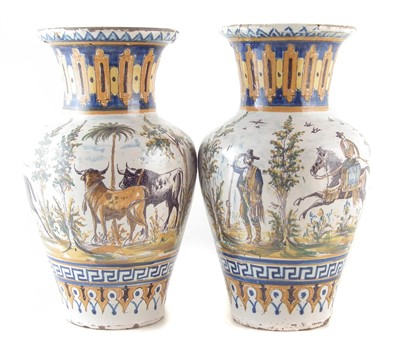 Lot 233 - Pair of Faience vases (both re-stuck and cracked).