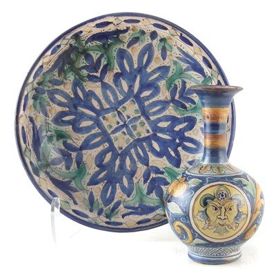 Lot 232 - Faience vase and a charger (neck and rim re-stuck of vase).