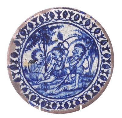 Lot 230 - Iranian pottery blue and white plate.