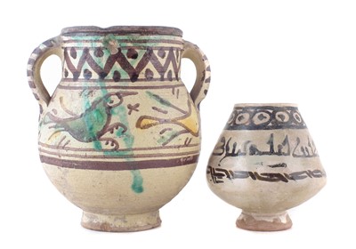 Lot 227 - Two Iranian pottery vases.