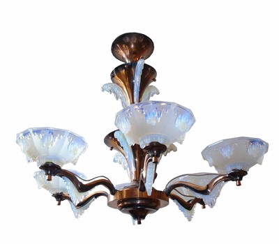 Lot 583 - An unusual 20th century copper effect six branch electrolier.