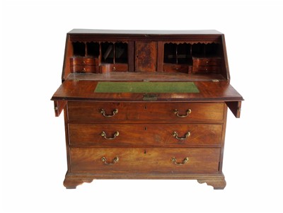 Lot 494 - George III figured mahogany bureau.