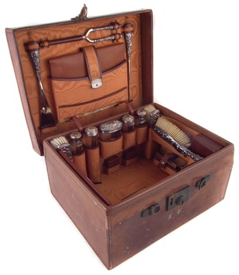 Lot 75 - An Edwardian silver cut glass dressing table set by Finnigans & Co, London