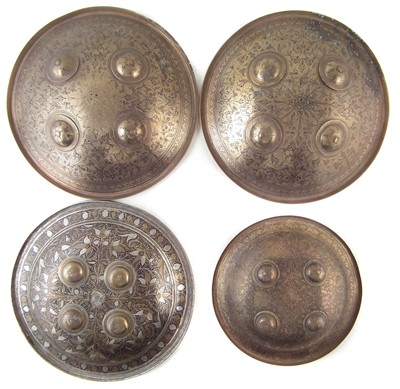 Lot 314 - Four Indian brass Dhal shields