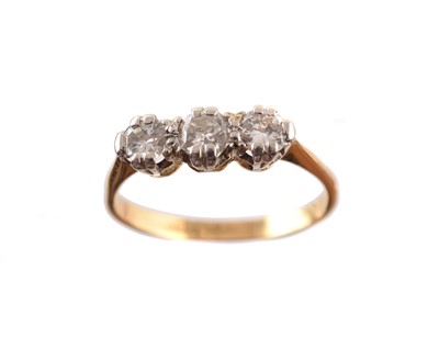Lot 186 - An 18ct gold diamond three stone ring