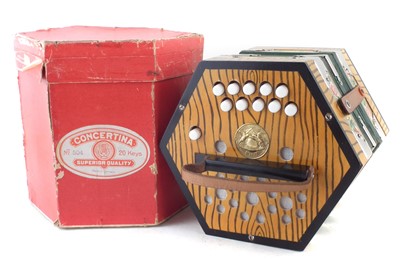 Lot 29 - Geman twenty key concertina with card case