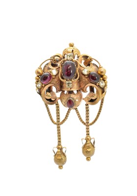 Lot 90 - A mid Victorian foil-back garnet and chrysoberyl brooch