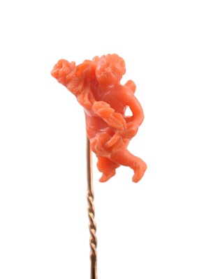 Lot 99 - A late 19th century coral stickpin