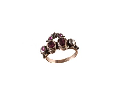 Lot 189 - A foil back ruby and diamond dress ring