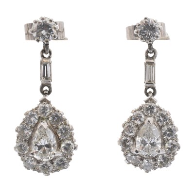 Lot 104 - A pair of diamond drop earrings