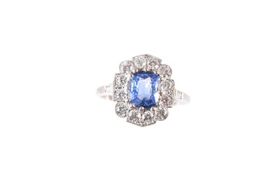 Lot 208 - A sapphire and diamond cluster ring