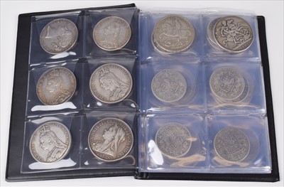 Lot 89 - Black album of various silver crowns together with a selection of various halfcrowns and others.