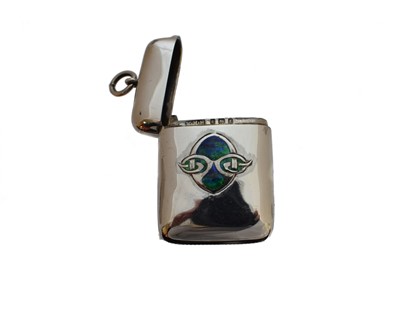 Lot 19 - A Liberty & Co. Cymric silver and enamel vesta case designed by Archibald Knox
