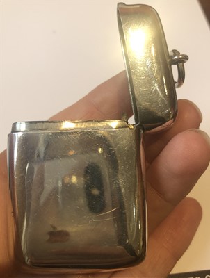 Lot 19 - A Liberty & Co. Cymric silver and enamel vesta case designed by Archibald Knox
