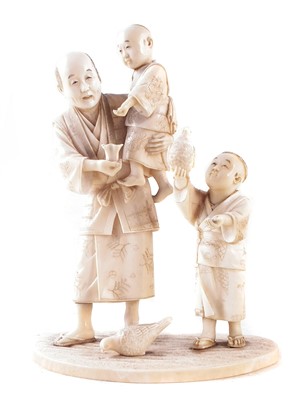 Lot 374 - Japanese ivory Farmer and sons feeding birds