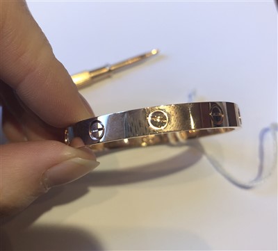 Lot 52 - A Cartier diamond LOVE bangle