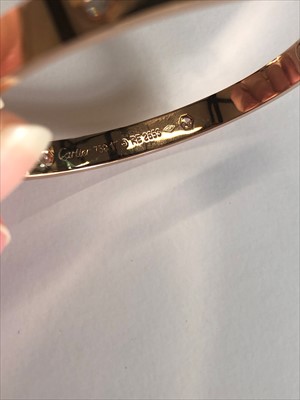 Lot 52 - A Cartier diamond LOVE bangle