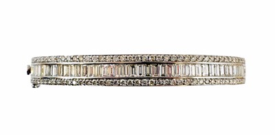 Lot 57 - A diamond hinged bangle