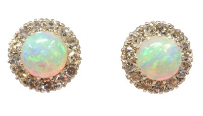 Lot 107 - A pair of opal and diamond earrings
