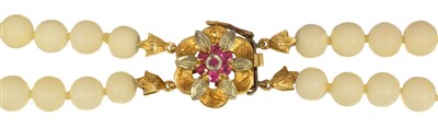 Lot 160 - A coral and ruby necklace