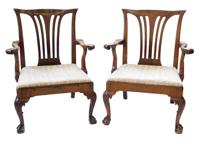 Lot 606 - Pair of walnut Chippendale style open arm carver chairs