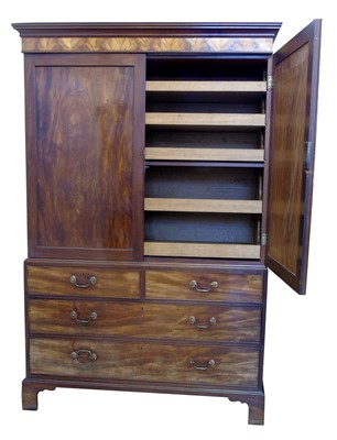 Lot 622 - George III mahogany press cupboard