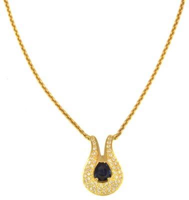 Lot 177 - An 18ct gold sapphire and diamond pendant