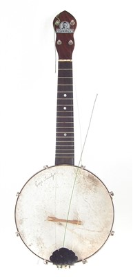 Lot 108 - George Formby banjolele with case and music