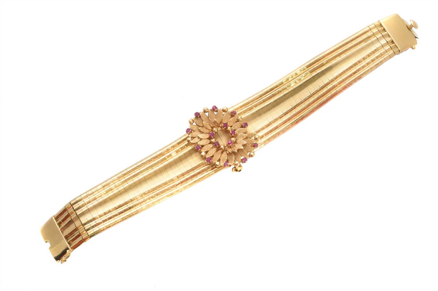 Lot 21 - An 18ct gold ruby bracelet