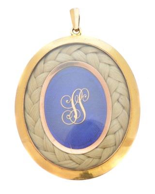 Lot 123 - A Victorian enamel and hairwork mourning pendant