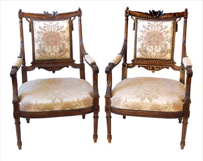 Lot 289 - A pair of late 19th century French walnut framed salon chairs