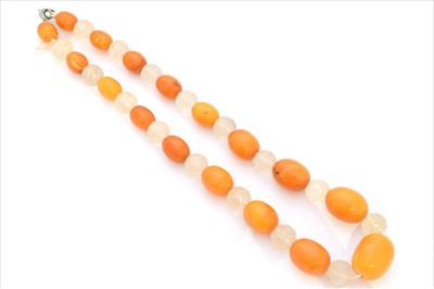 Lot 182 - A butterscotch amber and rock crystal necklace