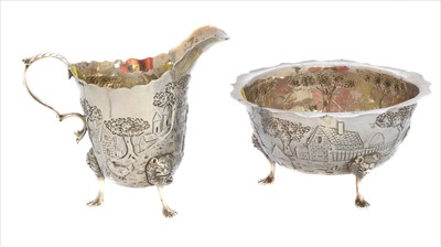 Lot 7 - A Georgian silver milk jug and sugar bowl
