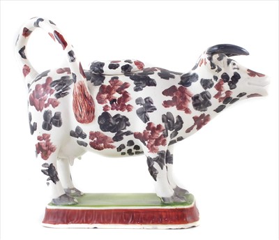 Lot 125 - Creamware cow creamer