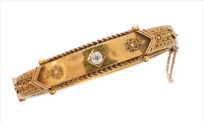 Lot 8 - A late Victorian diamond hinged bangle