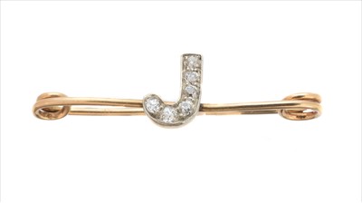 Lot 54 - A diamond initial brooch