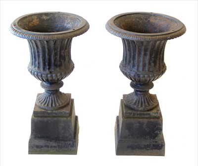 Lot 338 - A pair of Victorian cast iron urns
