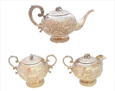Lot 45 - An Indian white metal three piece tea set