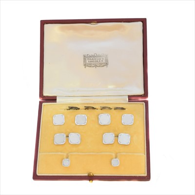 Lot 342 - A cased mother of pearl dress set retailed by Harrods