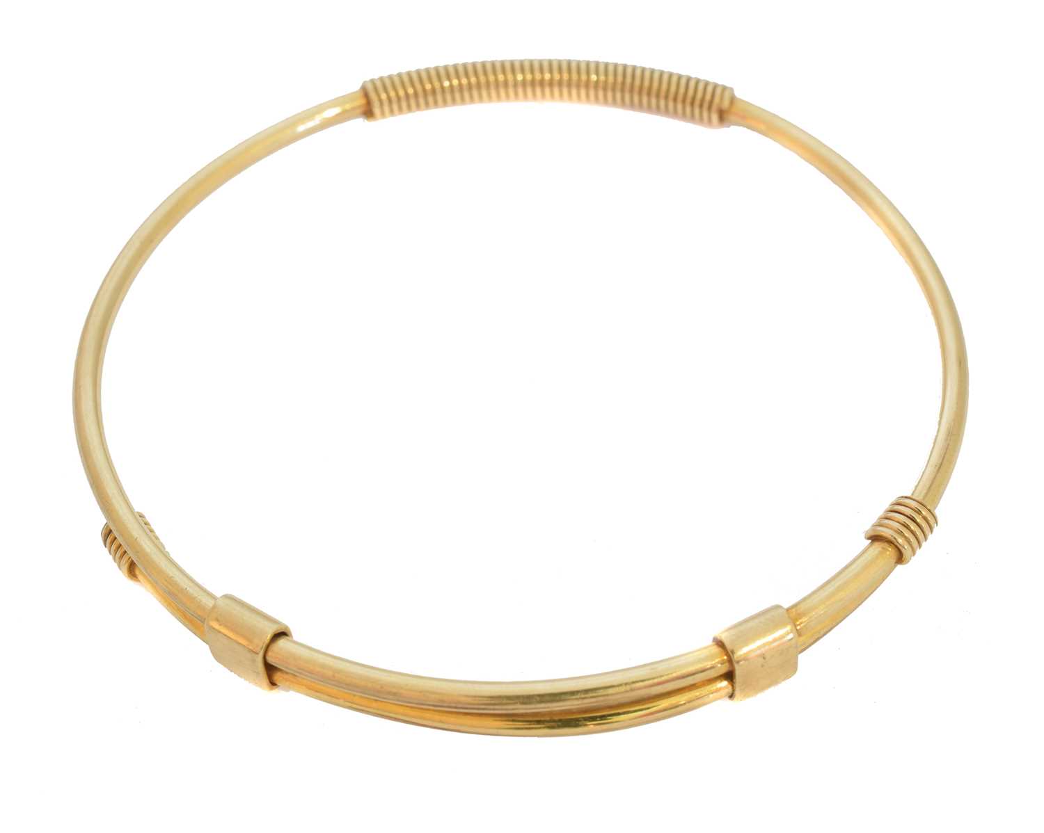 Lot 7 - A 9ct gold Gucci bangle