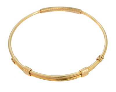 Lot 7 - A 9ct gold Gucci bangle