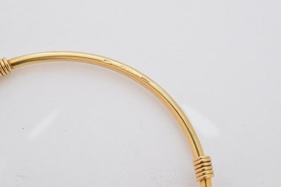 Lot 7 - A 9ct gold Gucci bangle