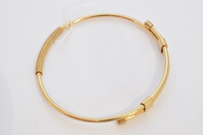 Lot 7 - A 9ct gold Gucci bangle