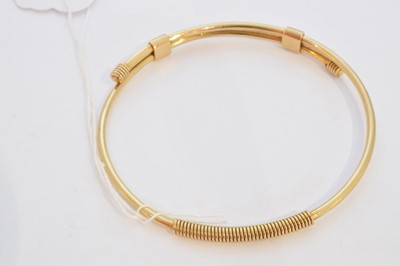 Lot 7 - A 9ct gold Gucci bangle