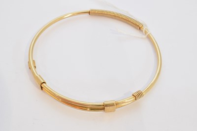 Lot 7 - A 9ct gold Gucci bangle