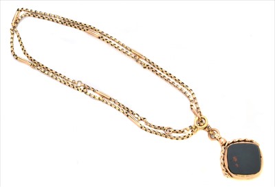 Lot 162 - An early 20th century 9ct gold hardstone swivel fob