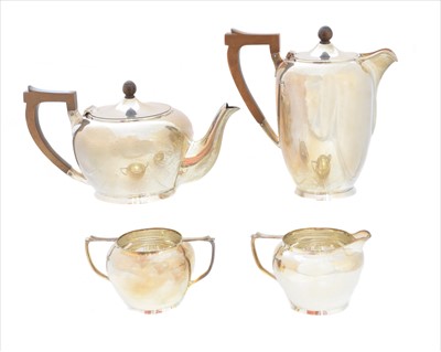 Lot 55 - A George VI silver four piece tea set